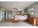 Spacious main bedroom with closet access, ensuite access and natural light at 8165 Tempest Ridge Way, Parker, CO 80134