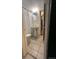 Cozy bathroom with pedestal sink, white tile floor and shower curtain at 1024 E 14Th Ave # 2, Denver, CO 80218