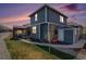 Backyard view featuring a pergola and an outdoor seating area at 8852 Farmdale St, Firestone, CO 80504