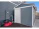 Detached backyard shed for extra storage, nestled next to the house at 8852 Farmdale St, Firestone, CO 80504