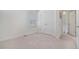 This bedroom features a window, closet, carpet, and view of a bathroom at 8852 Farmdale St, Firestone, CO 80504