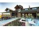 Exterior of the golf club clubhouse featuring outdoor seating at 8852 Farmdale St, Firestone, CO 80504