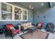 Cozy patio featuring wicker seating, a modern heater, and an inviting outdoor rug at 8852 Farmdale St, Firestone, CO 80504