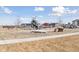 Community playground with slides, climbing structures, and open space for recreation at 21823 E 8Th Ave, Aurora, CO 80018