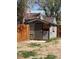 Backyard shed with a wooden fence on either side at 1368 Joliet St, Aurora, CO 80010