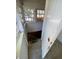 Basement entrance with staircase and natural light through windows at 1368 Joliet St, Aurora, CO 80010