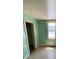 Bedroom features include a window and closet, allowing for bright space at 1368 Joliet St, Aurora, CO 80010