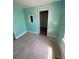 An empty bedroom with freshly painted walls allows for a bright space at 1368 Joliet St, Aurora, CO 80010