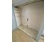 A walk-in closet has bare walls and is ready to be configured at 1368 Joliet St, Aurora, CO 80010