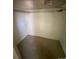 A walk-in closet has bare walls and is ready to be configured at 1368 Joliet St, Aurora, CO 80010