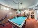 Basement with a pool table and finished walls at 2220 W 73Rd Pl, Denver, CO 80221