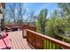 Relax on this deck featuring comfortable seating and beautiful backyard views at 9536 W Avalon Dr, Littleton, CO 80127