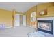 Main bedroom includes a fireplace and access to the ensuite bathroom at 9536 W Avalon Dr, Littleton, CO 80127