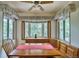 Cozy dining area with built-in seating and large windows bringing in natural light at 1607 Ulysses St, Golden, CO 80401