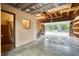 Open garage with extra storage and a view of the driveway at 1607 Ulysses St, Golden, CO 80401