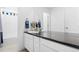 Contemporary bathroom with sleek vanity, framed mirror, and a shower and bath for a spa-like retreat at 8353 Bijou Creek Ave, Littleton, CO 80125
