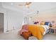 Bright bedroom with tray ceiling, mural, and colorful bedding and accents at 8353 Bijou Creek Ave, Littleton, CO 80125