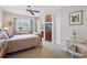 Charming bedroom with closet, bathroom access, and stylish furnishings at 2244 Fenton St, Edgewater, CO 80214
