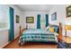 Comfortable bedroom with a large window and warm, inviting decor at 2244 Fenton St, Edgewater, CO 80214