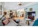 Comfortable living room features vaulted ceilings, natural light, and stylish furnishings at 2244 Fenton St, Edgewater, CO 80214