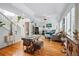 Bright living room with hardwood floors, comfortable seating, and decorative accents at 2244 Fenton St, Edgewater, CO 80214