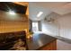 Modern kitchen includes sleek countertops, stainless appliances, and natural lighting at 3100 S Federal Blvd # 307, Denver, CO 80236
