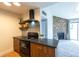 Modern kitchen includes sleek countertops, stainless appliances, and open floorplan at 3100 S Federal Blvd # 307, Denver, CO 80236