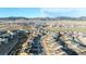 Aerial view of the neighborhood showcasing the suburban landscape and distant mountains at 17850 W 94Th Dr, Arvada, CO 80007