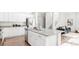 Spacious kitchen with granite countertops, stainless steel appliances, and an island perfect for entertaining at 17850 W 94Th Dr, Arvada, CO 80007