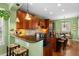 Modern kitchen with granite countertops, stainless steel appliances, and an island at 5400 Heatherton Ln, Highlands Ranch, CO 80130