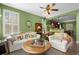 Comfortable living room with inviting decor and open access to the kitchen area at 5400 Heatherton Ln, Highlands Ranch, CO 80130