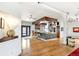 Bright kitchen with island, modern appliances and hardwood floors at 4730 W Moncrieff Pl, Denver, CO 80212