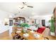 Open concept living space featuring dining area, living room, and gourmet kitchen at 4730 W Moncrieff Pl, Denver, CO 80212