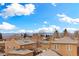 Neighborhood view with the Rocky Mountains visible on a sunny day at 4730 W Moncrieff Pl, Denver, CO 80212
