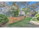 Beautiful grassy backyard with a wooden fence and view of townhomes at 1325 S Idalia St, Aurora, CO 80017