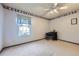 Inviting bedroom with window, neutral walls and cozy carpet at 1325 S Idalia St, Aurora, CO 80017