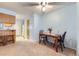 Bright dining area with light blue walls and room for a Gathering meal or entertaining guests at 1325 S Idalia St, Aurora, CO 80017