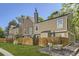 Townhouse exterior with fenced yards, mature trees, and well-maintained lawns at 1325 S Idalia St, Aurora, CO 80017