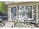 Welcoming front entrance with stone facade, updated door, and manicured landscaping at 1325 S Idalia St, Aurora, CO 80017