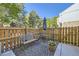 Charming fenced patio with outdoor seating, rug, and a peaceful setting at 1325 S Idalia St, Aurora, CO 80017