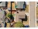 Aerial view of the property showcasing the fenced backyard, patio and lush landscaping at 6616 Zinnia St, Arvada, CO 80004
