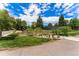 Charming wooden bridge amidst lush greenery and landscaping at 13850 E Marina Dr # 606, Aurora, CO 80014