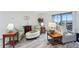 Inviting living room with stylish furnishings and a balcony at 13850 E Marina Dr # 606, Aurora, CO 80014