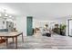 Open living area with wood floors, updated kitchen, and comfortable seating at 13850 E Marina Dr # 606, Aurora, CO 80014