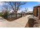 Inviting pool area with tables and umbrellas in a well-maintained community space at 13850 E Marina Dr # 606, Aurora, CO 80014