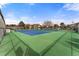 Bright and clean community tennis court with a green and blue surface at 13850 E Marina Dr # 606, Aurora, CO 80014