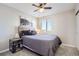 Guest bedroom with double bed and ceiling fan at 14461 Mosaic Ave, Parker, CO 80134