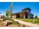 Modern community clubhouse with stone and wood exterior at 14461 Mosaic Ave, Parker, CO 80134