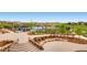 Large community pool and water features with surrounding landscaping at 14461 Mosaic Ave, Parker, CO 80134