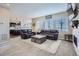 Open concept living area with a view into the kitchen and seating area at 14461 Mosaic Ave, Parker, CO 80134